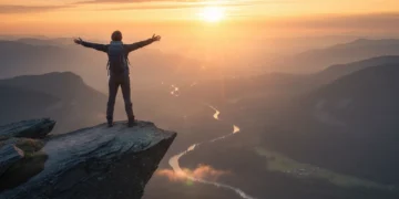Person confidently overlooking a vast landscape, symbolizing overcoming fear.